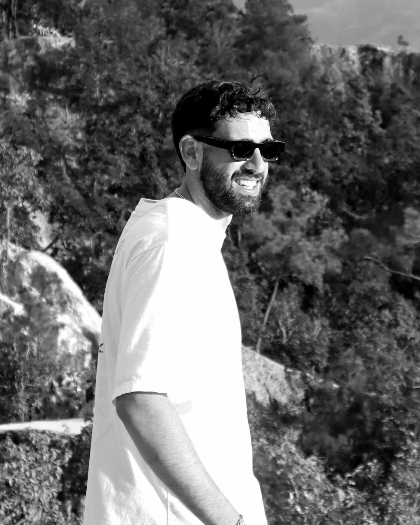 Ofek Cohen — Brand & AI Designer, outdoors in profile